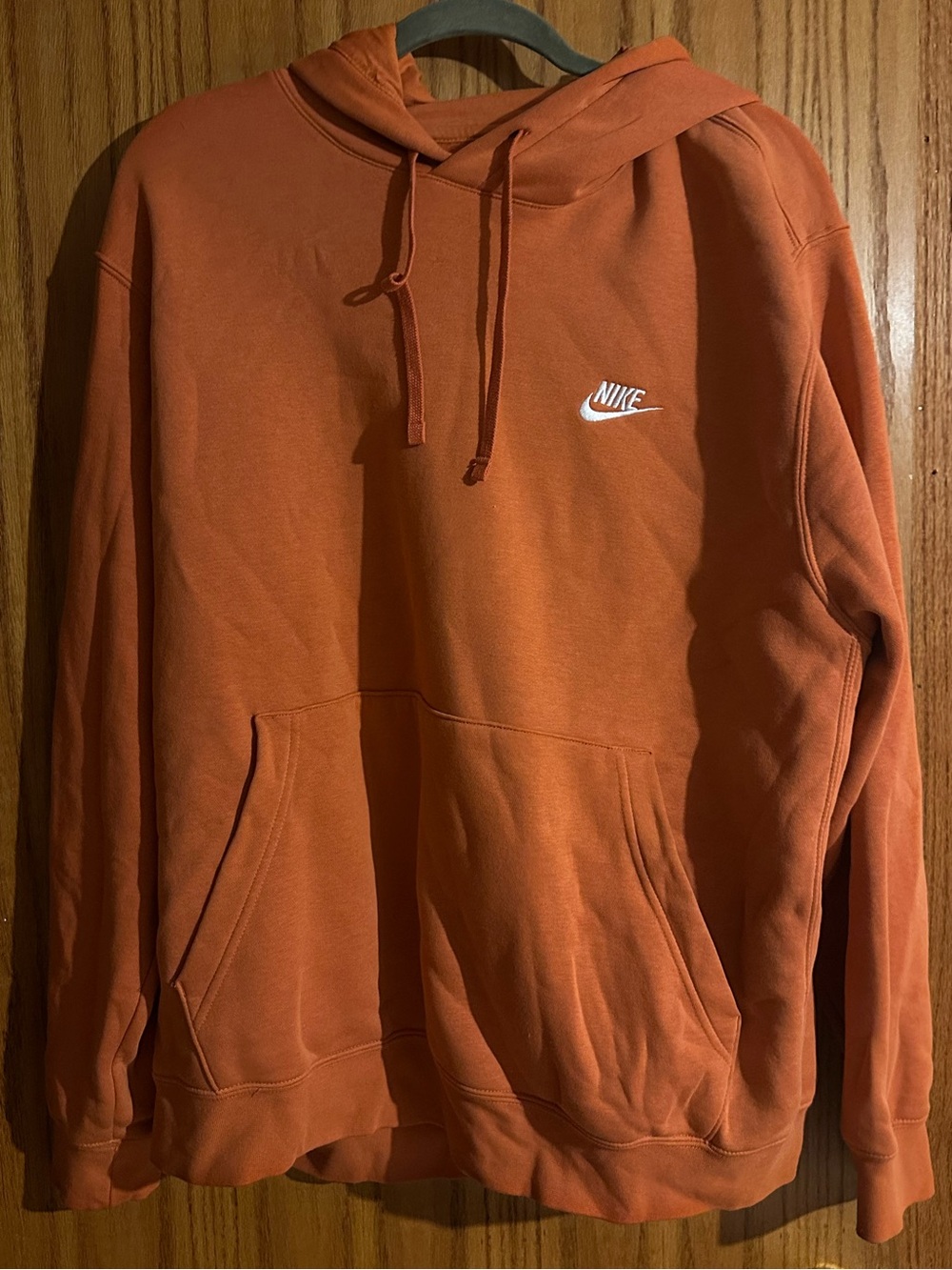 Nike Orange Pullover Hoodie with White Swoosh
